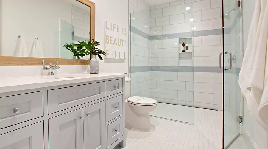 Elegant marble bathroom with glass shower